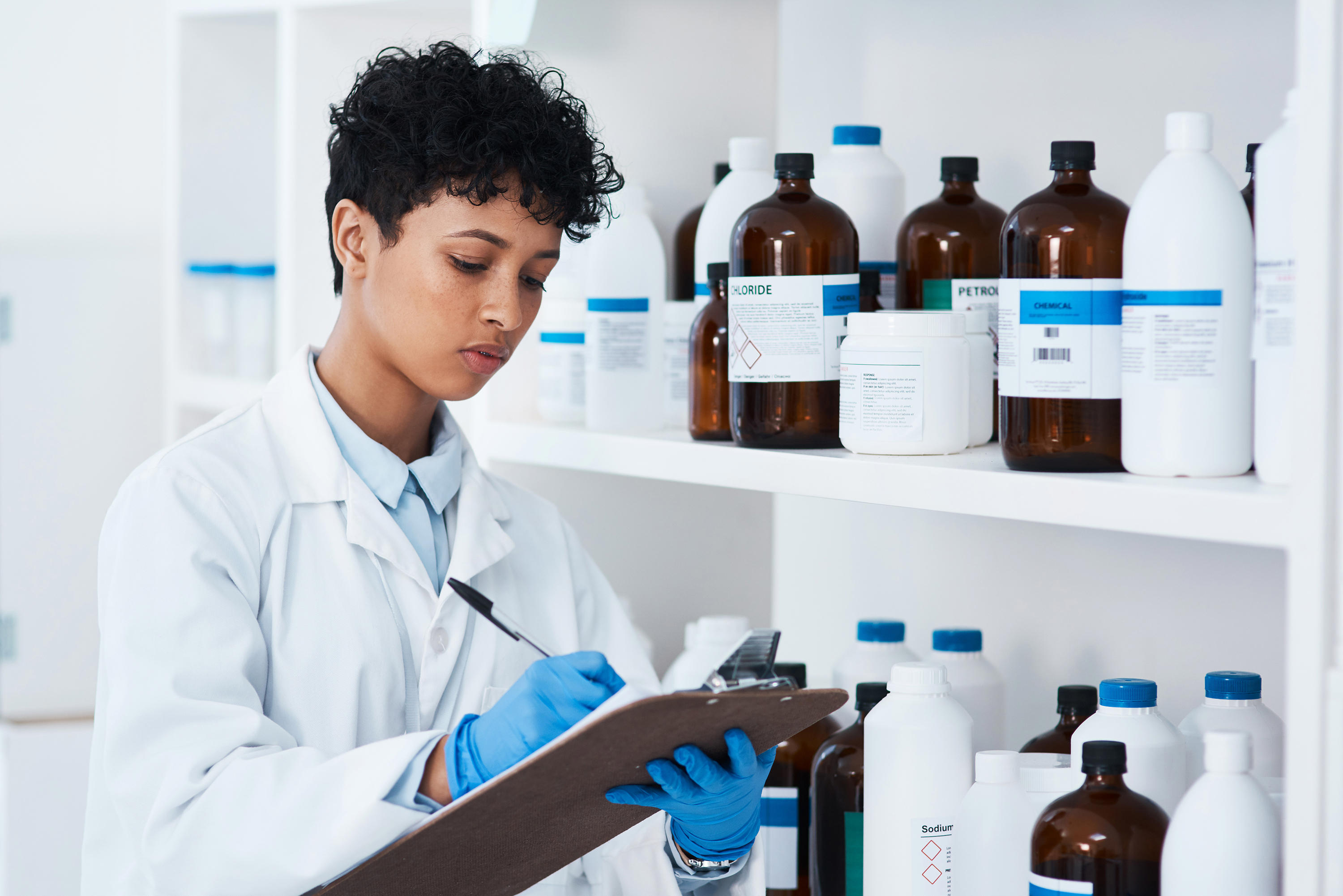 commercial-phase_woman-looking-at-clipboard