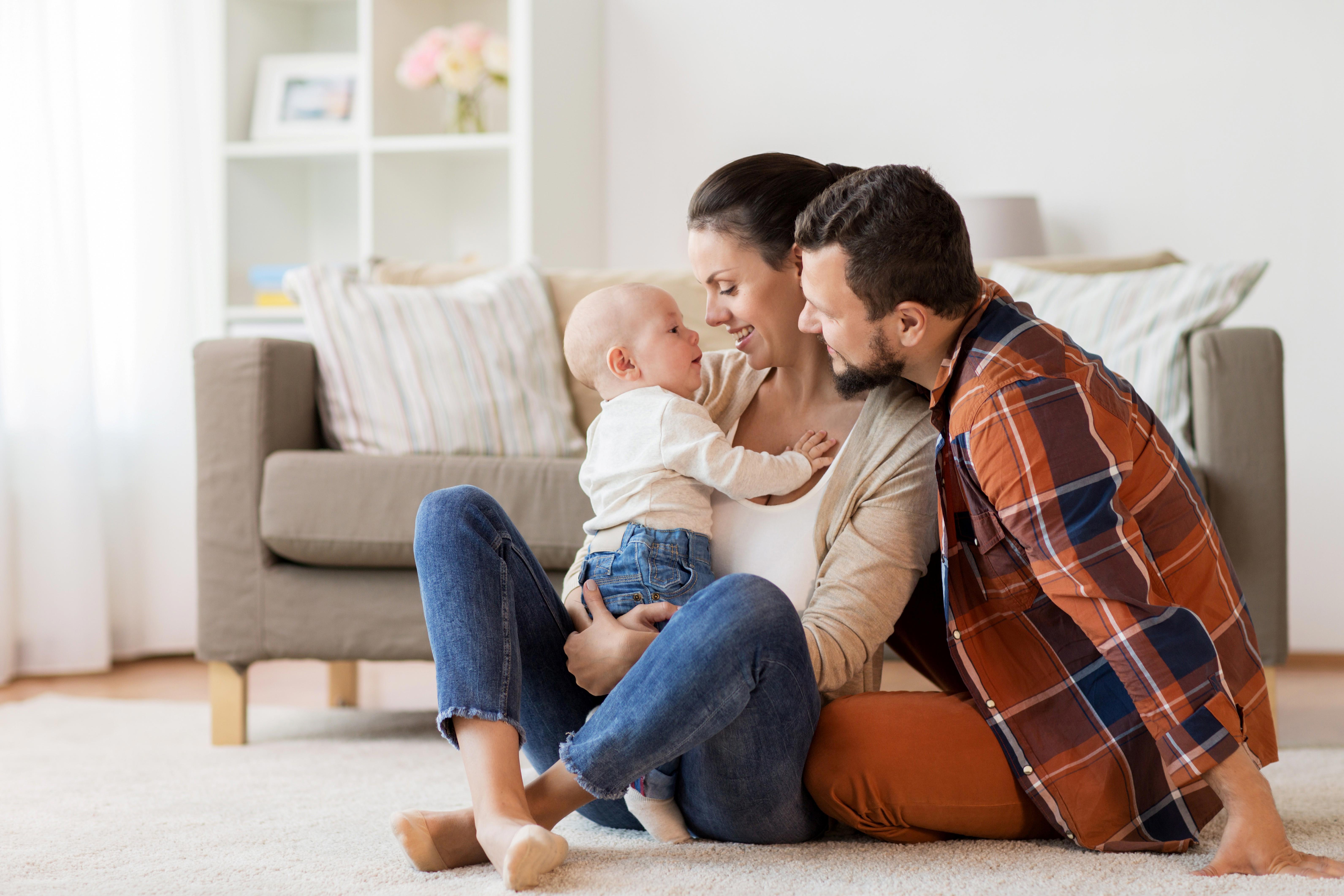 happy-family-with-baby-having-fun-at-home_6367x4245px