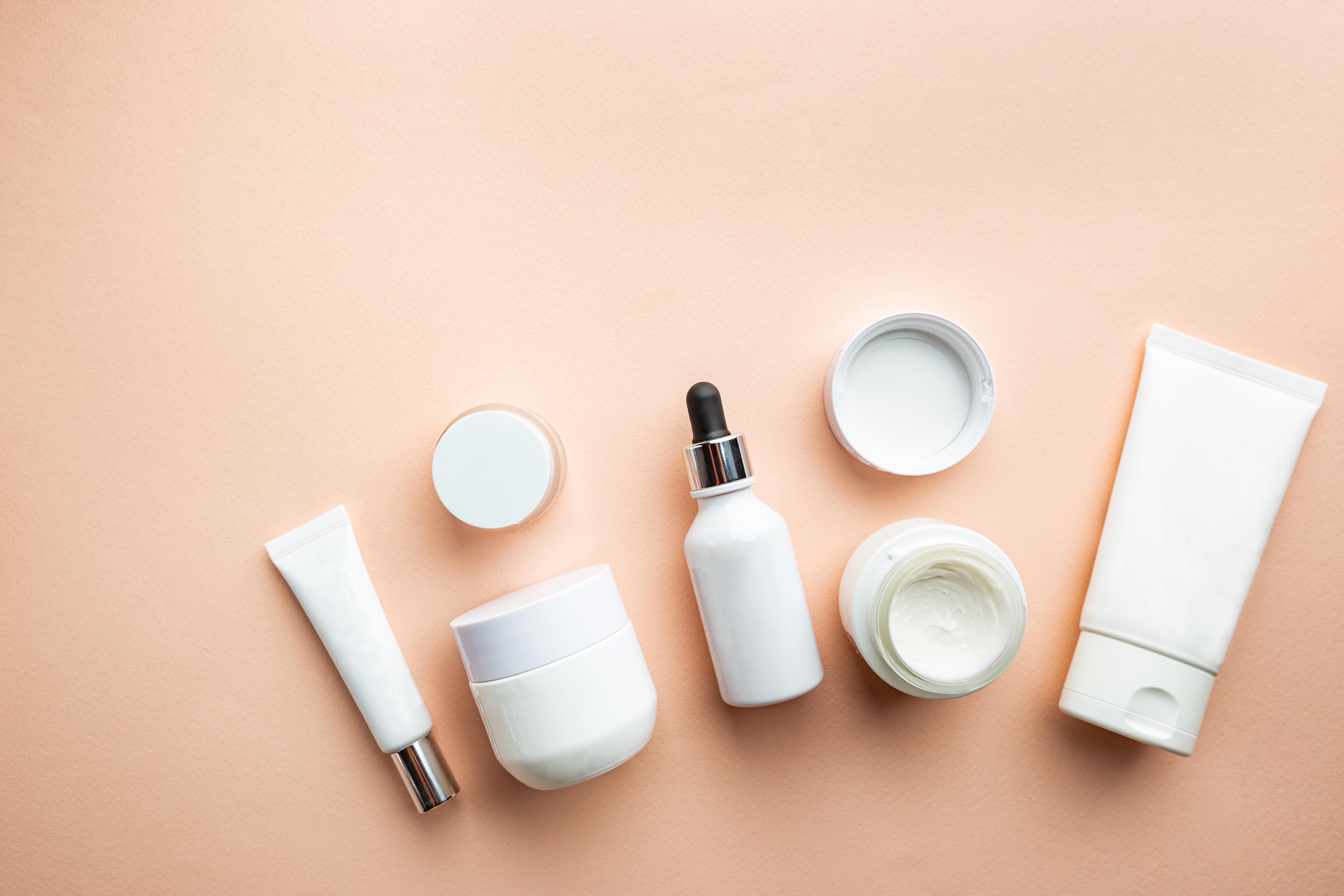 set-of-cosmetic-products-on-beige-background-flat-lay-top-view_6750-x-4500-px