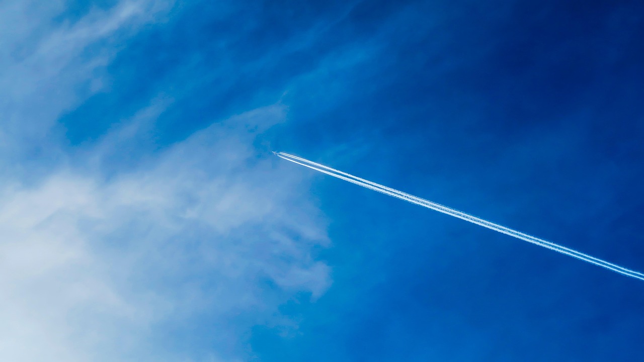 airplane-in-blue-sky-web