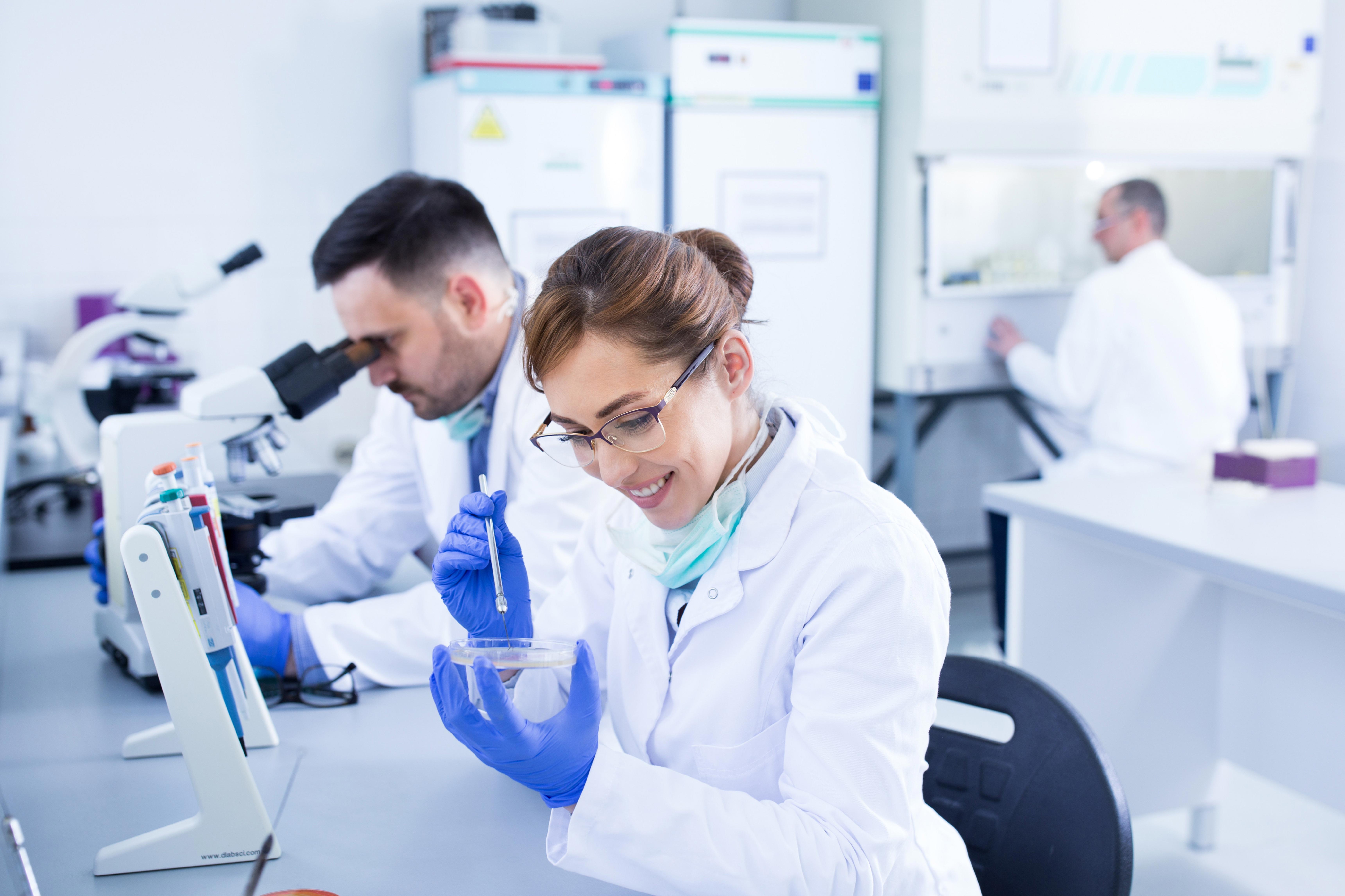 team-of-experienced-biologists-working-on-samples-in-laboratory_6882-x-4587-px