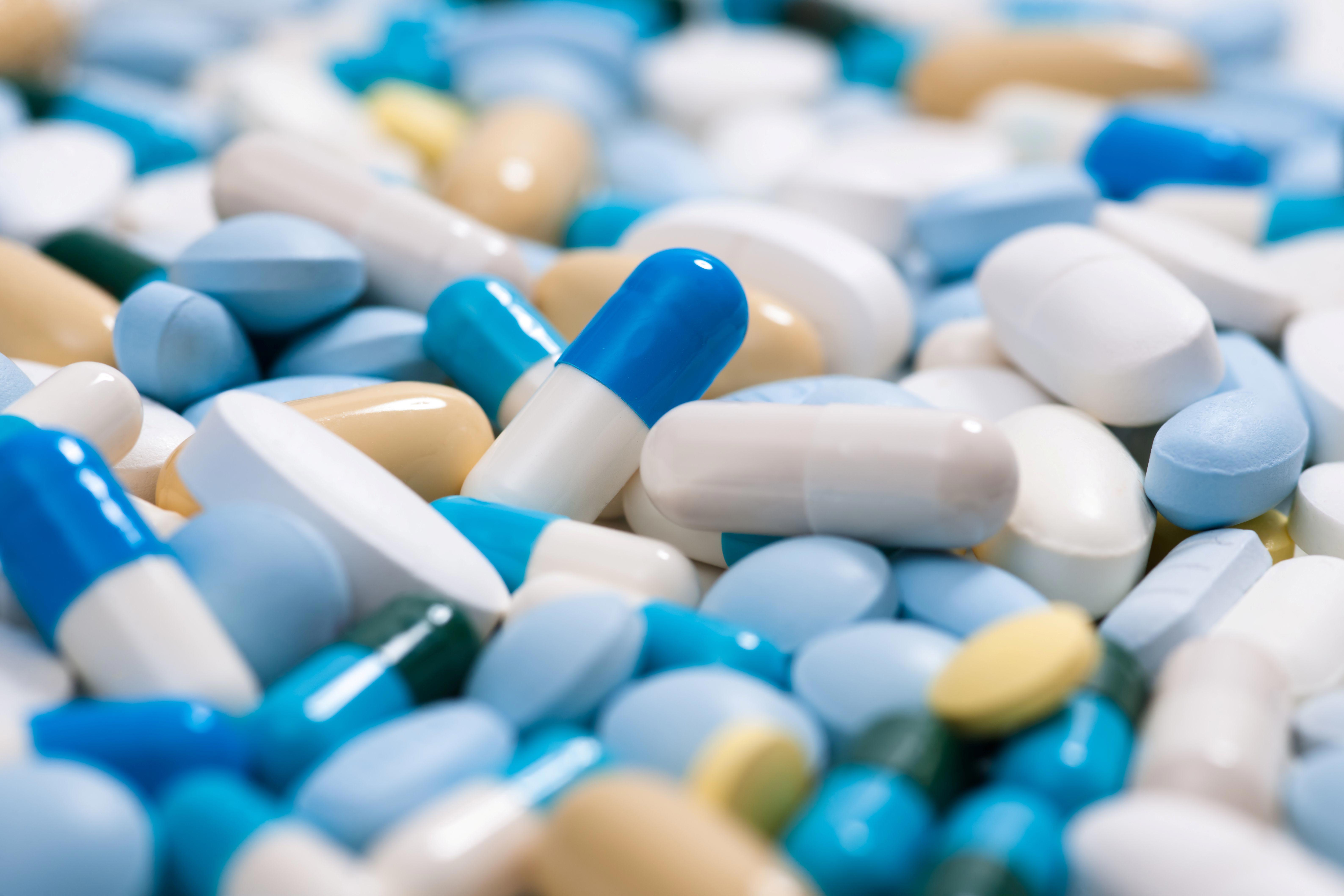 heap-of-medicine-pills-background-made-from-colorful-pills-and-capsules-6350x4233