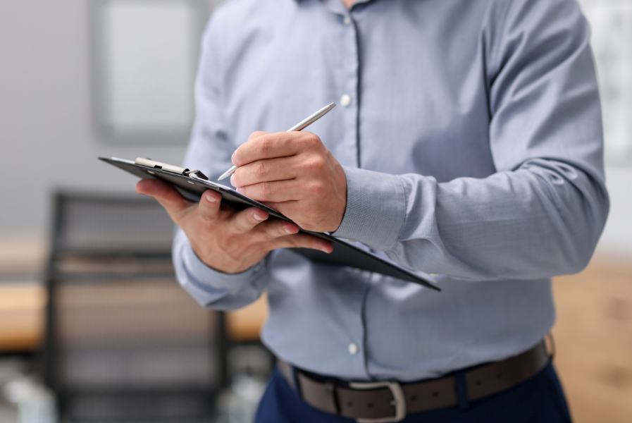 real-estate-appraisal-inspector-with-clipboard-conducting-property-valuation-at-home-closeup