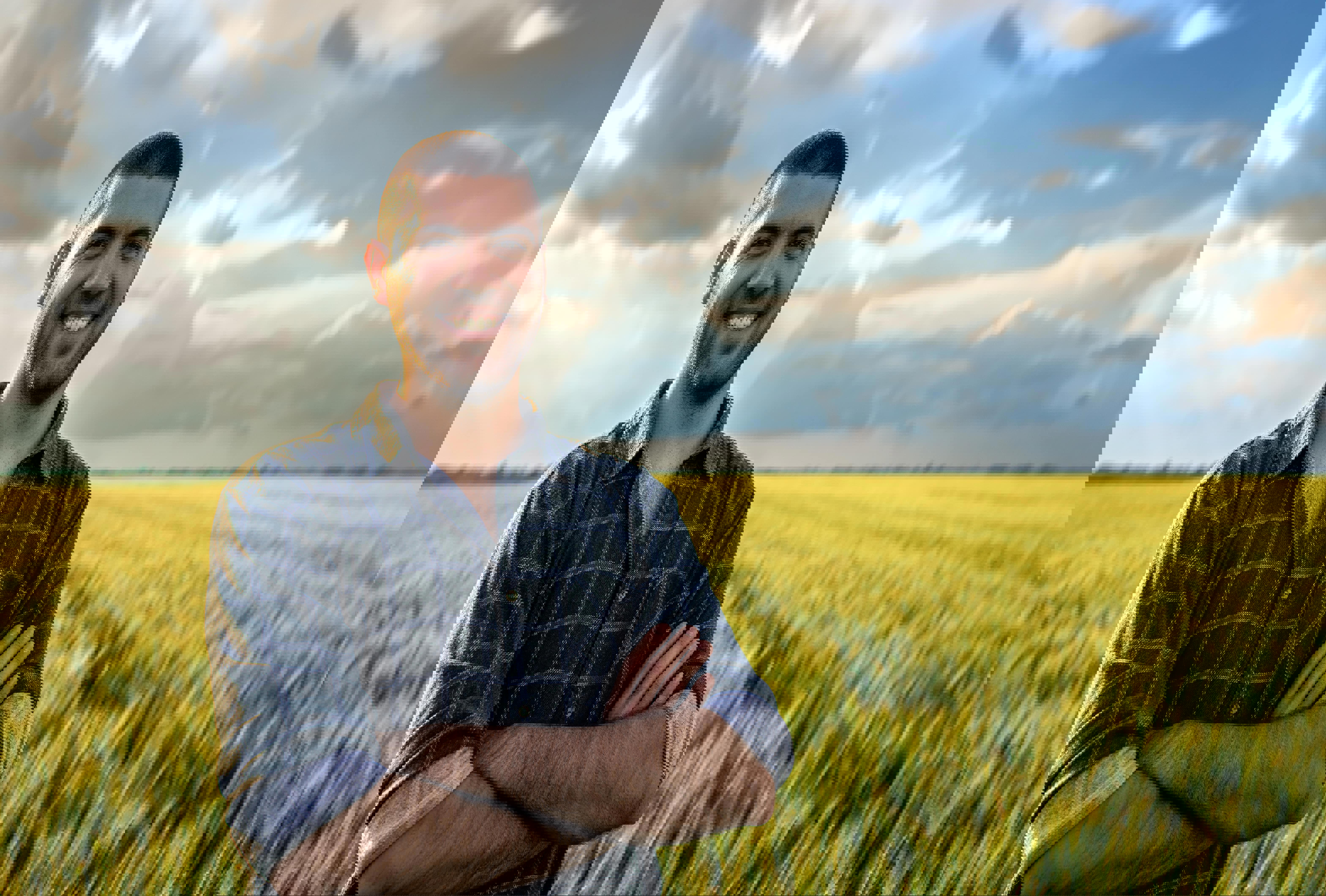 agro-farmer-in-young-wheat-field-6276x4242