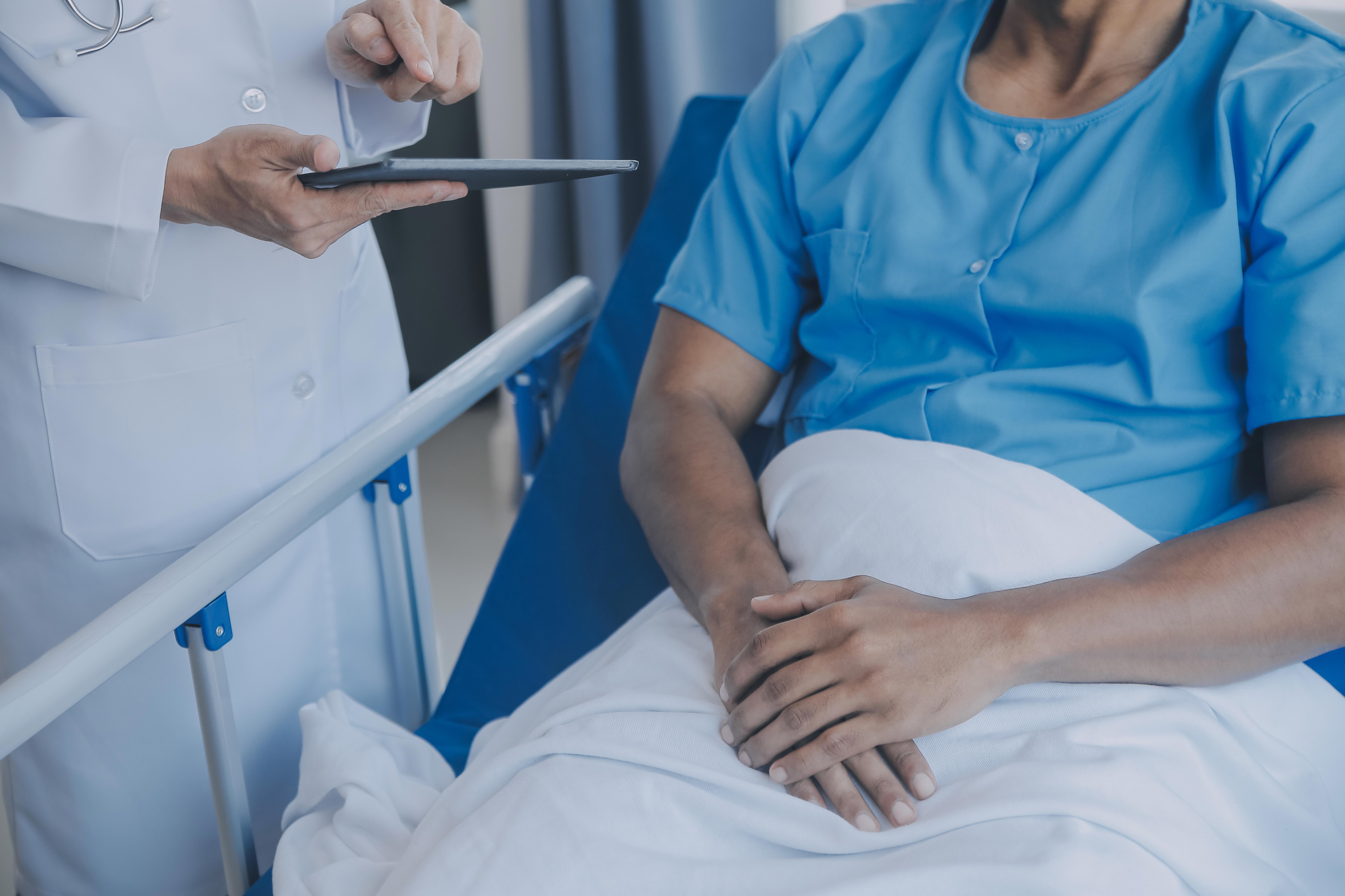 doctor-and-patient-discussing-health-exam-results_8208-x-5472px