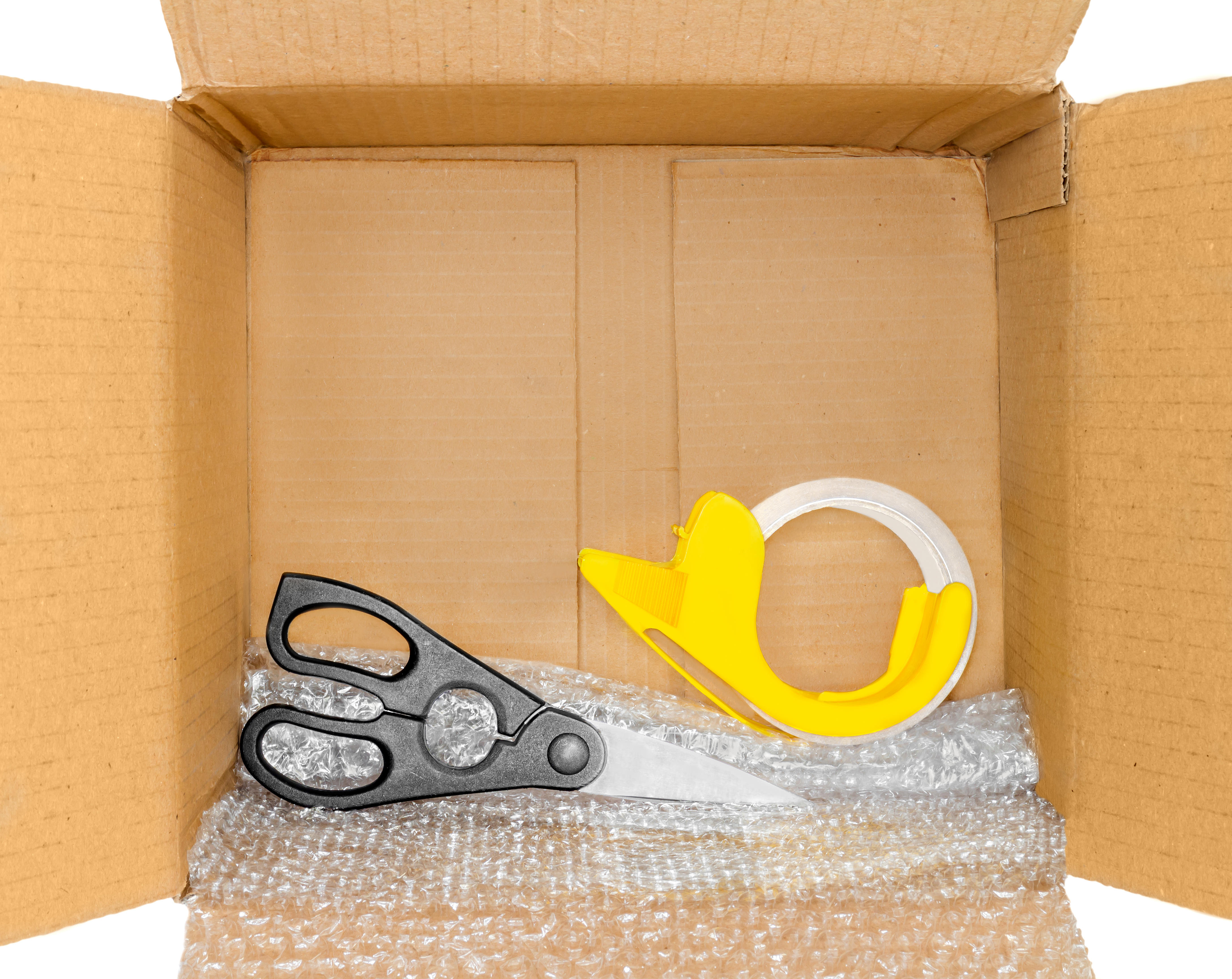 packing-tools-inside-corrugated-box-open-brown-cardboard-box-xxl_4351x3456px