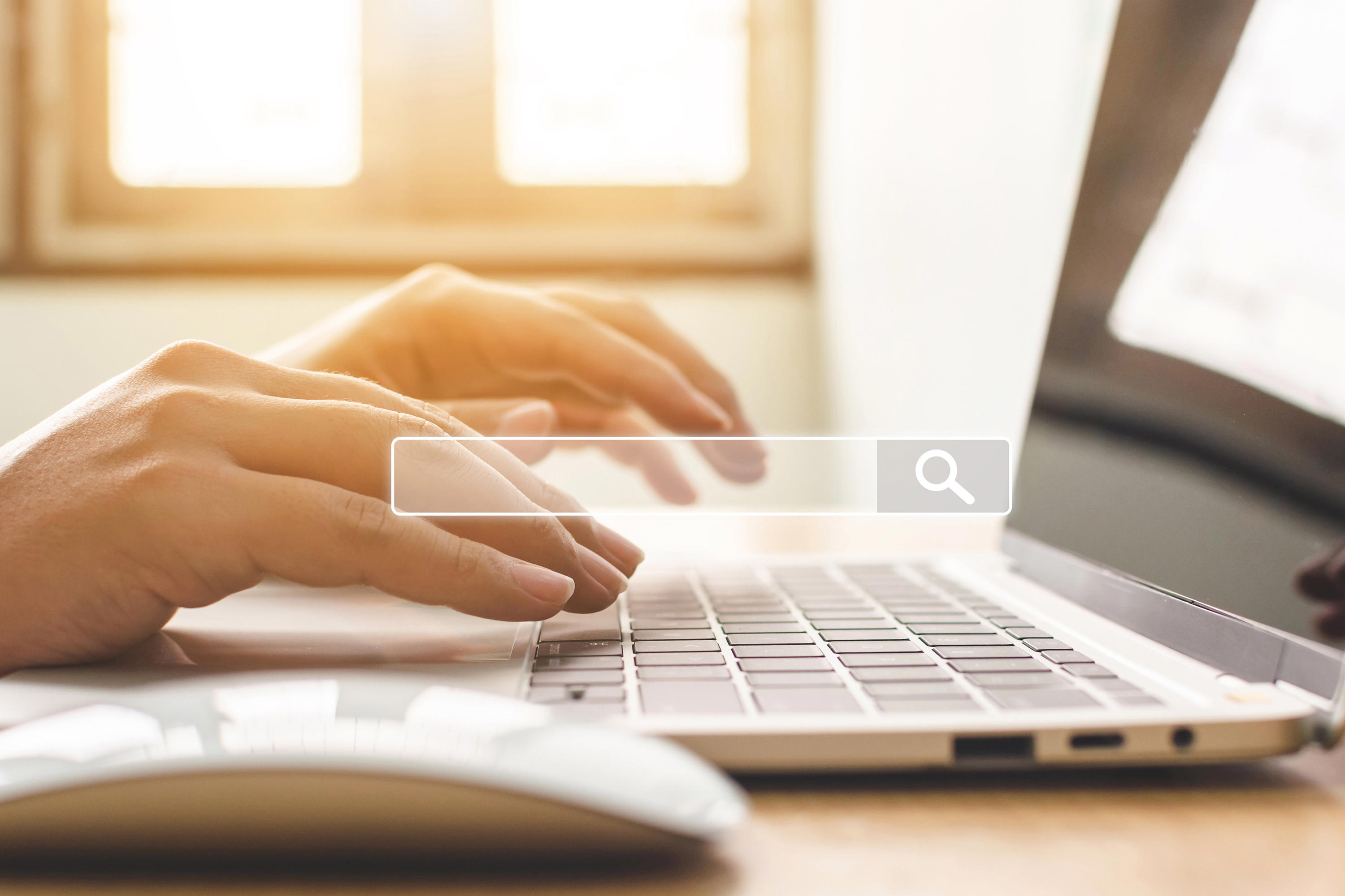 searching-information-data-on-internet-networking-concept-hand-of-male-typing-text-on-laptop-keyboard_-small-px_order