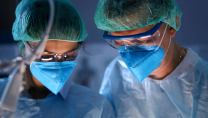 close-up-of-serious-professional-surgeons-in-blue-masks-at-operating-room_14305-x-7987px (1)