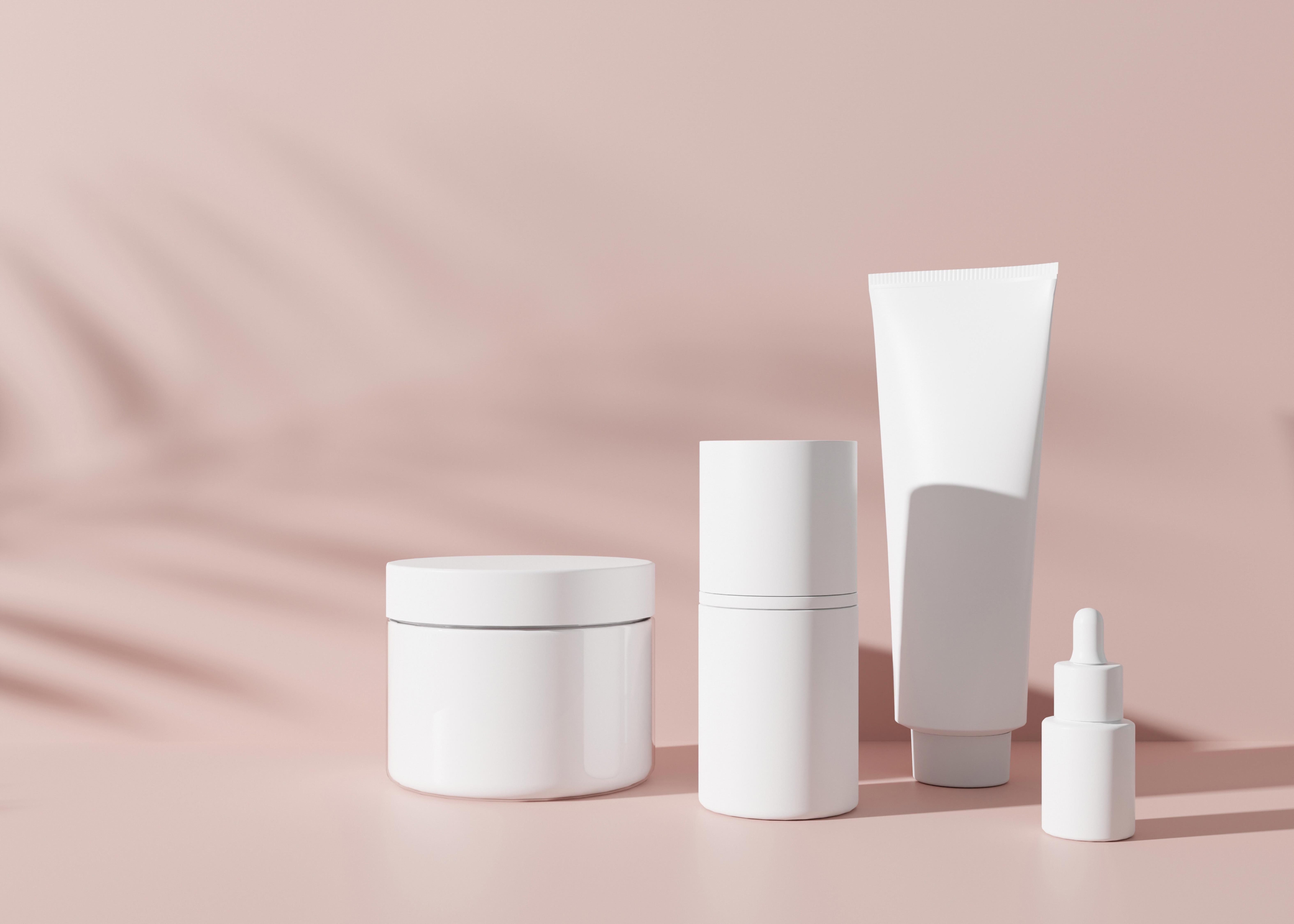 group-of-white-and-blank-unbranded-cosmetic-cream-jars-and-tubes-on-pink-background_6300-x-4500-px