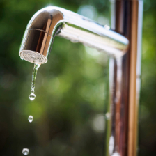 water-tap-with-water-drop-in-outdoor-green-park_6879-x-5160-px1