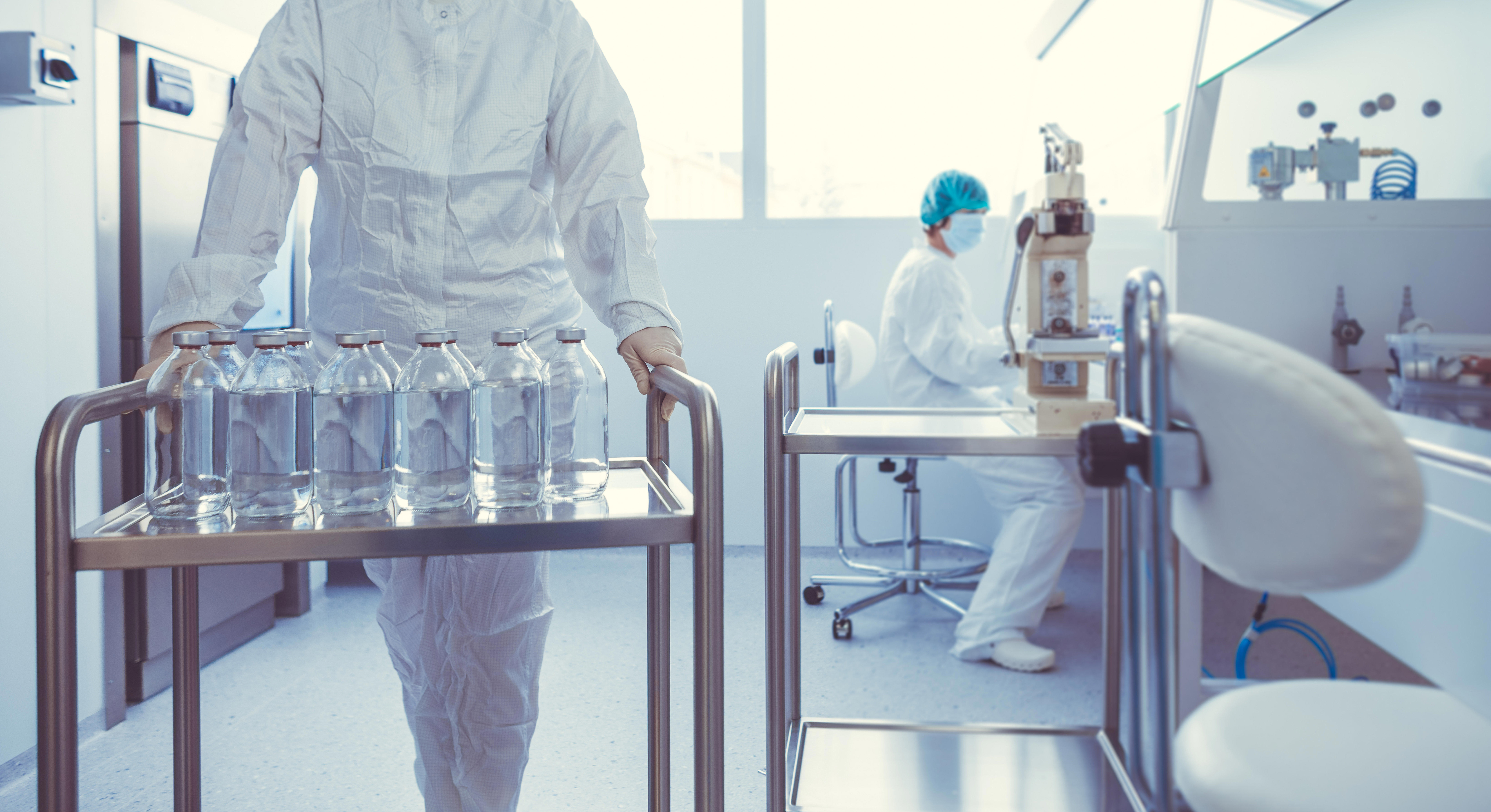flasks-with-liquids-in-a-lab-pharmaceutical-industry-factory-and-production-laboratory_8640-x-4707-px