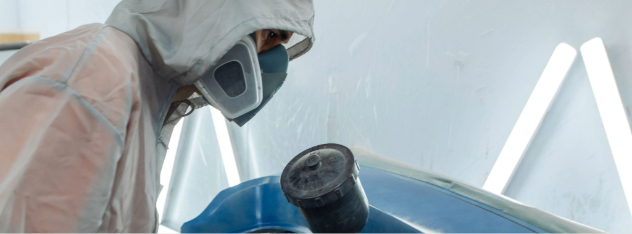 professional-car-painter-is-painting-in-garage-by-airbrush_8125-x-5418-px1