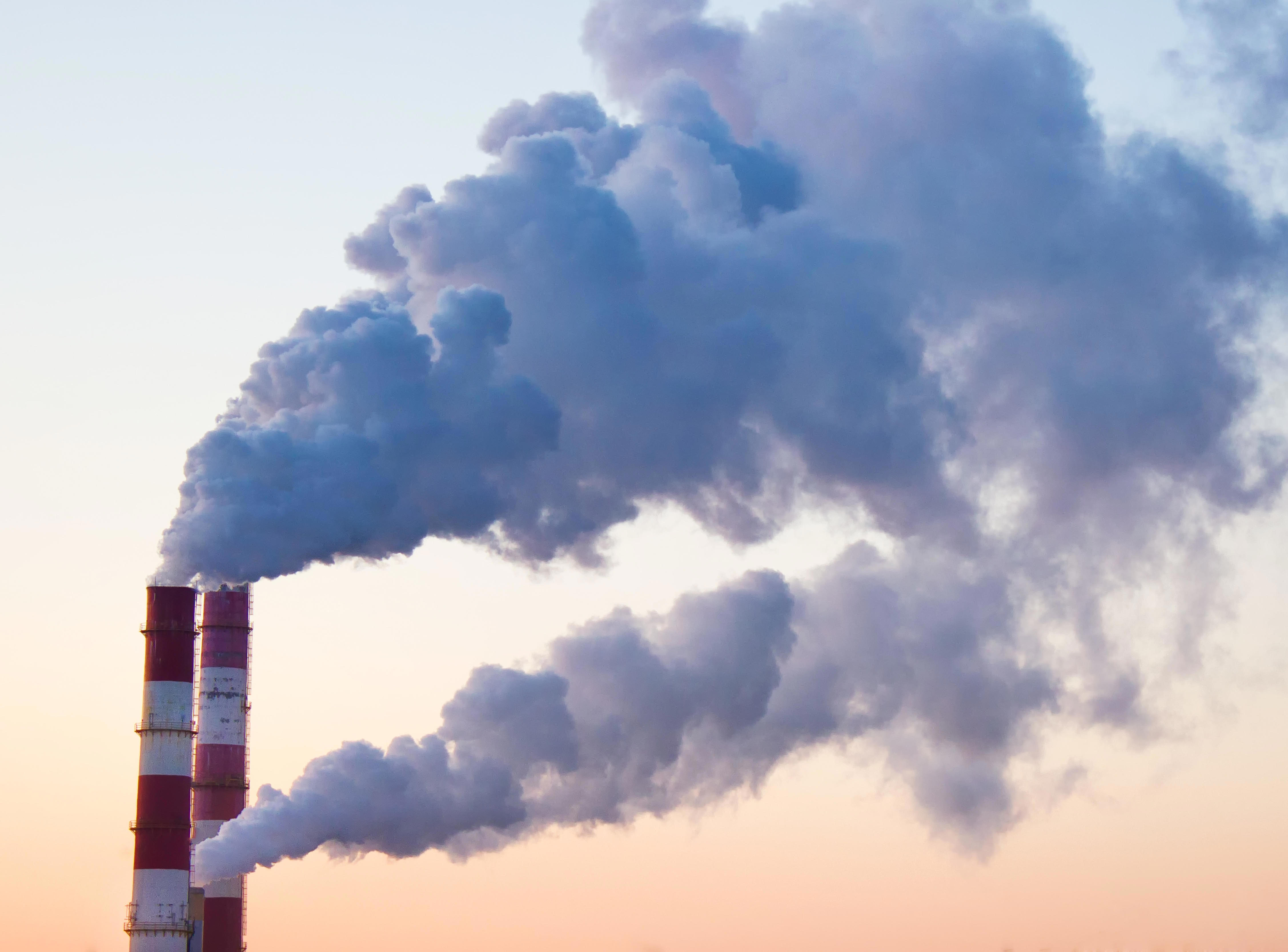 smoke-fumes-coming-out-of-pipes-of-factory-producing-heat-for-central-heating-flippedcut