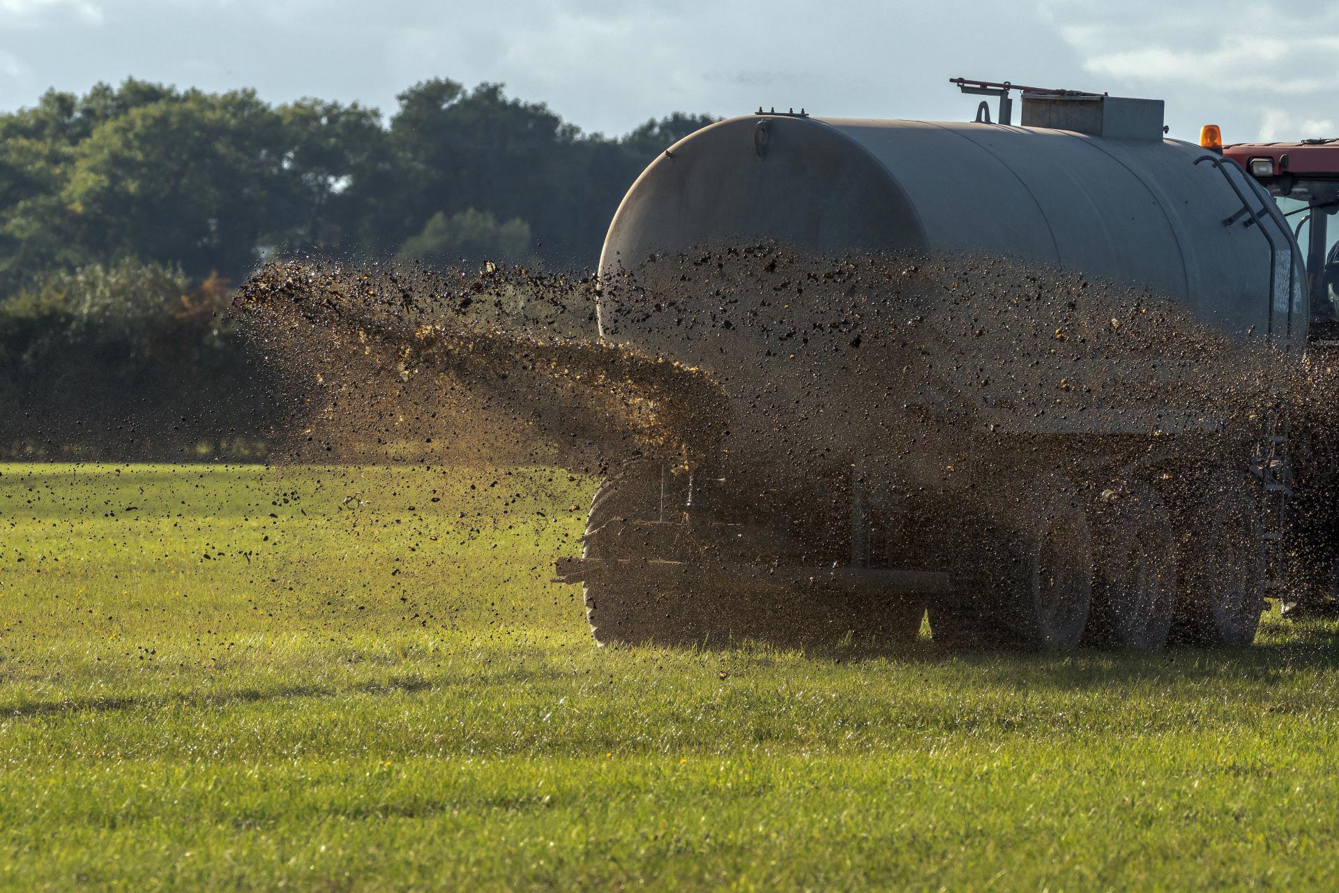 a-farm-tractor-sprays-its-manure-from-the-tanker-onto-a-field_8352-x-5568-px_2