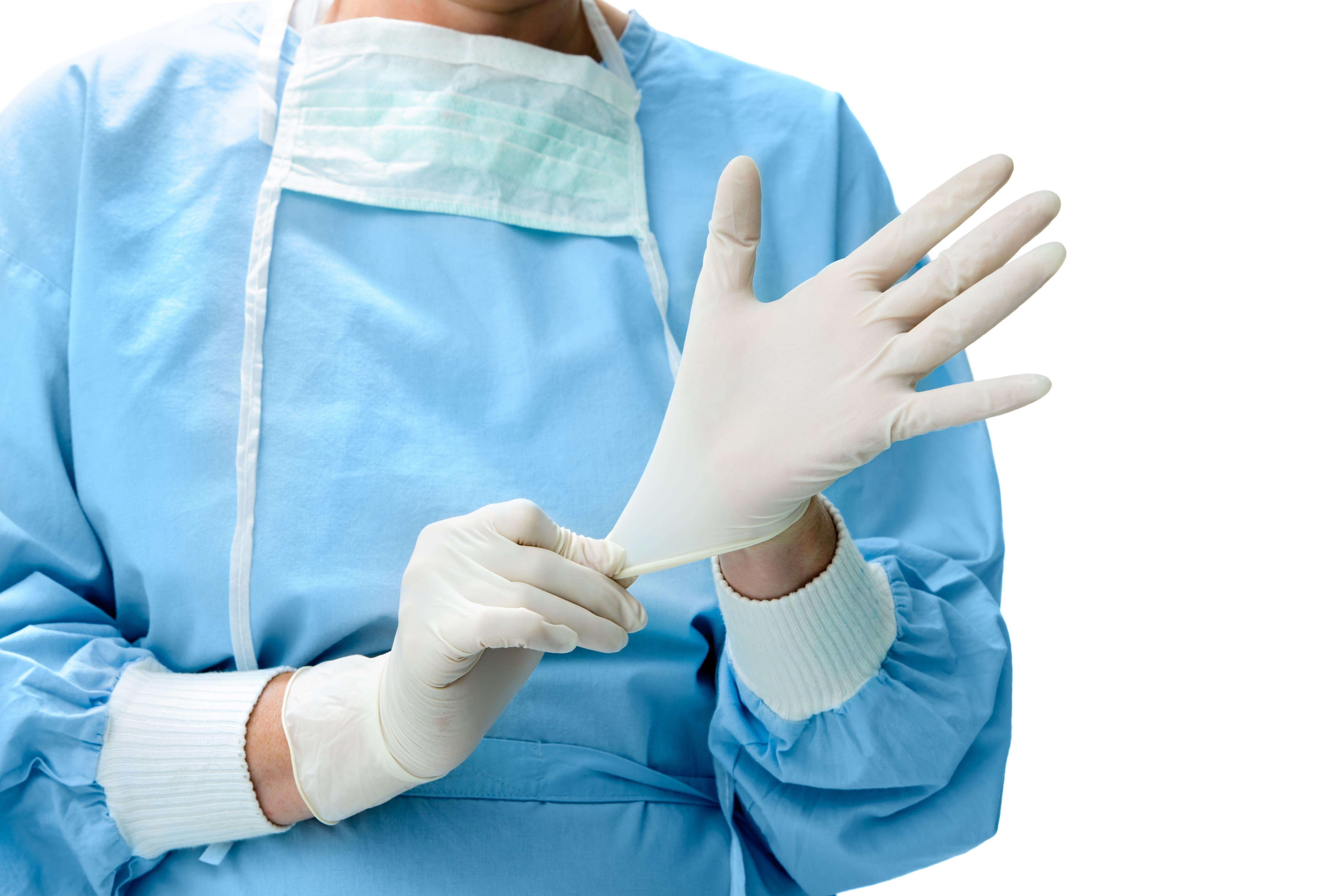 doctor-putting-on-sterilized-surgical-gloves_9072-x-6048-px