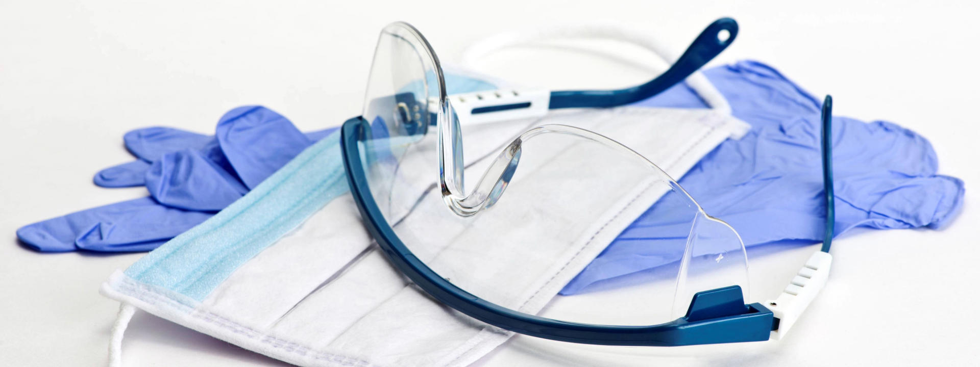 gloves-mask-and-safety-glasses-for-personal-protection-during-medical-procedures_11040-x-7368-px1