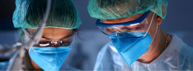 close-up-of-serious-professional-surgeons-in-blue-masks-at-operating-room_14305-x-7987px1