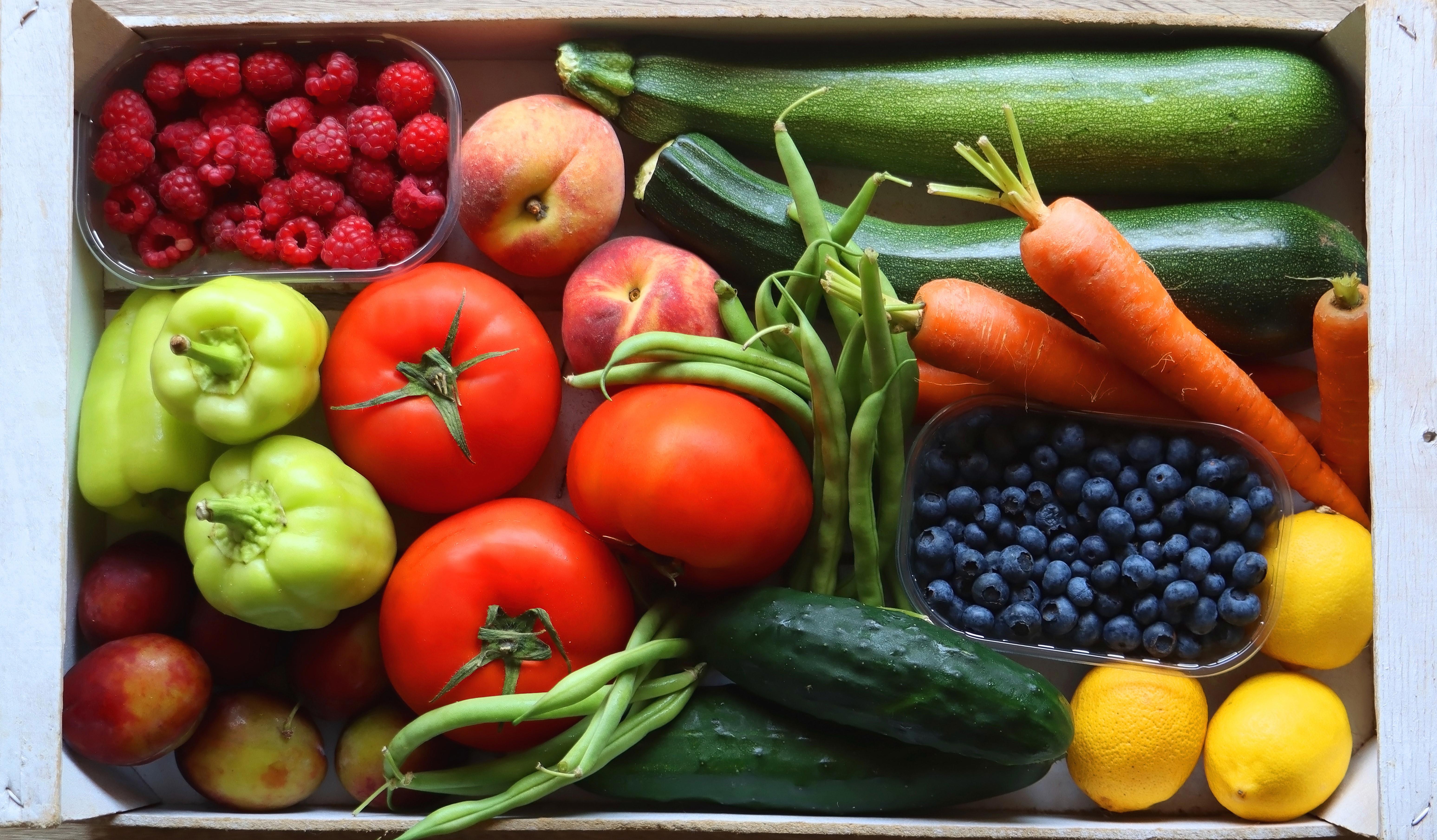wooden-crate-full-of-healthy-seasonal-fruit-and-vegetable-top-view-wooden-background7500-x-4999px