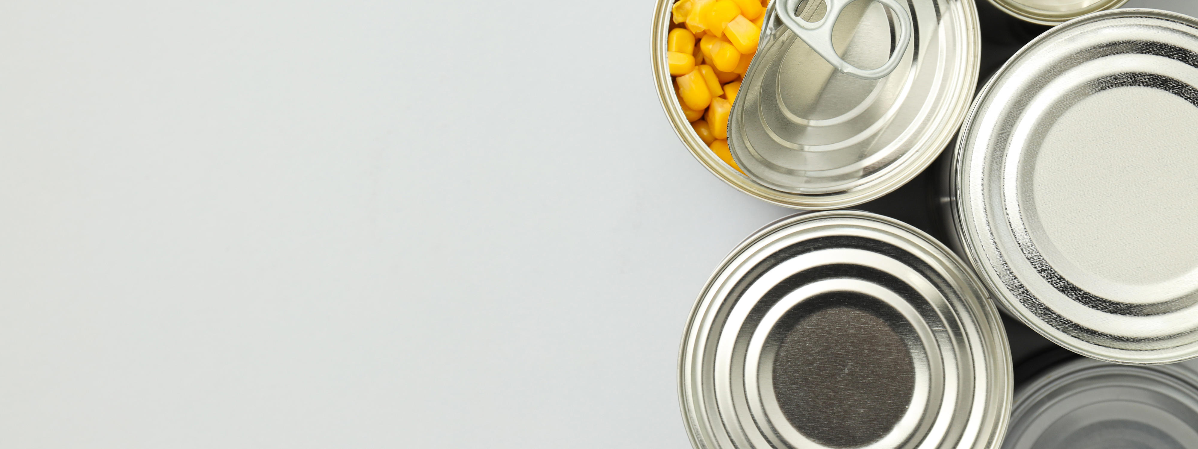 canned-food-in-blank-metal-jars-concept-of-canned-food_1920x720