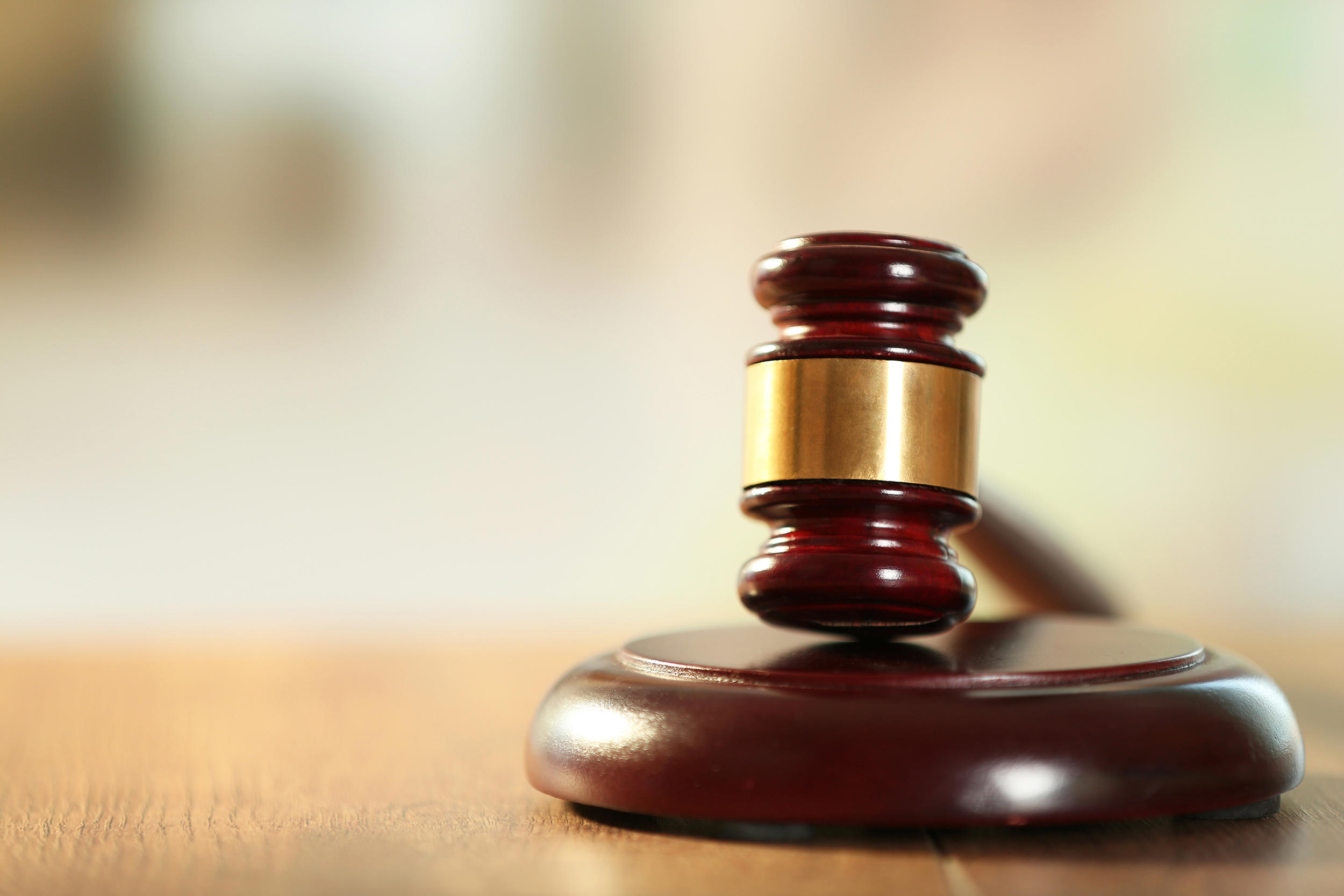 wooden-judges-hammer-on-wooden-table_small