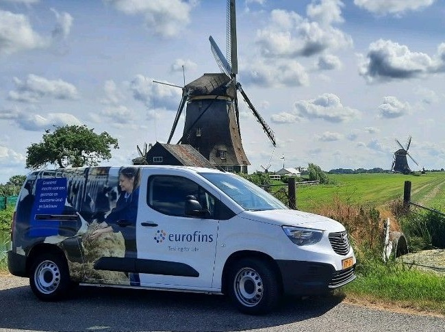 agro-sample-taking-car-old-wind-mill