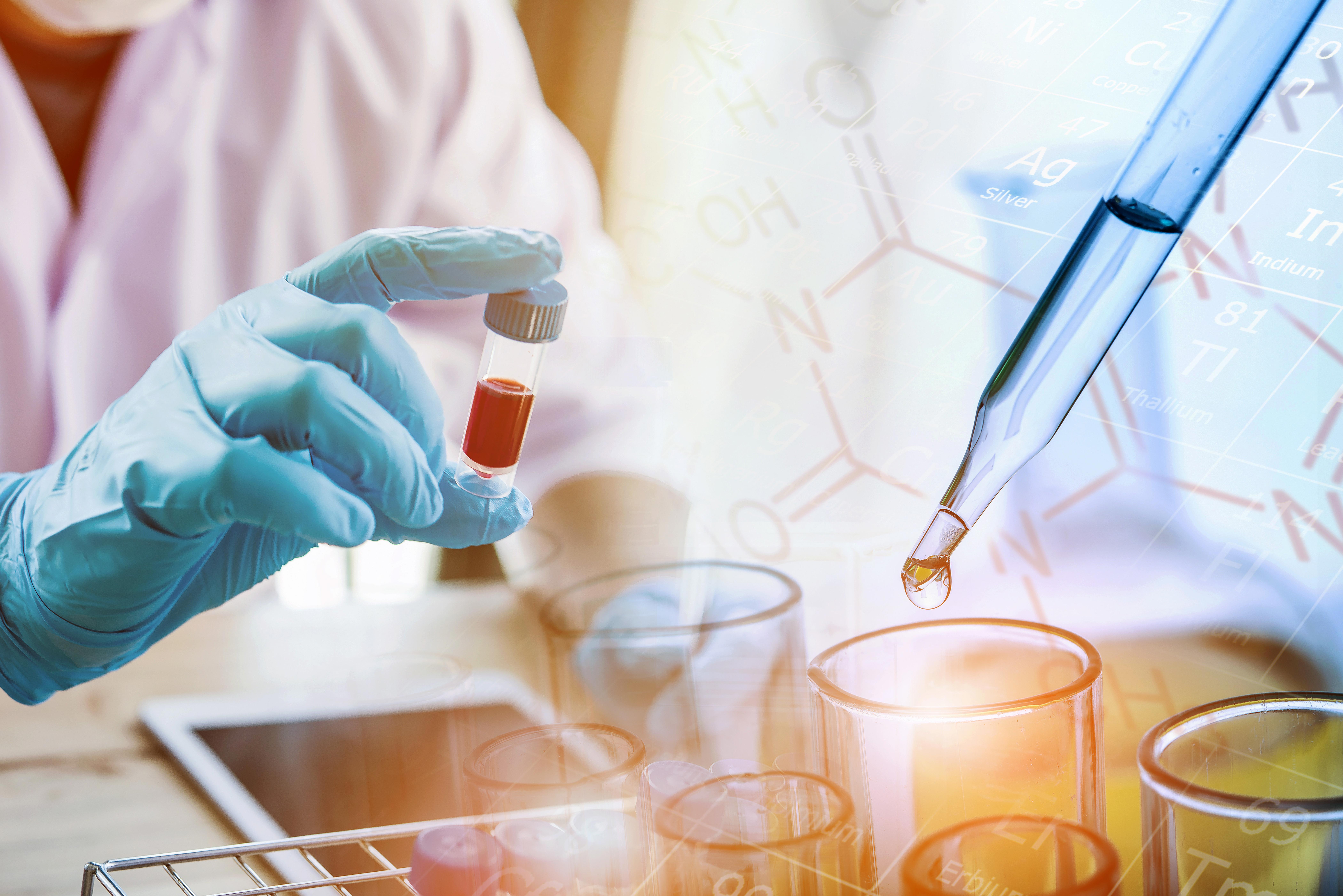 lab-technician-assistant-analyzing-a-blood-sample-in-test-tube-with-dropping-liquid-sample-to-test-tube-at-laboratory_8400-x-5607px