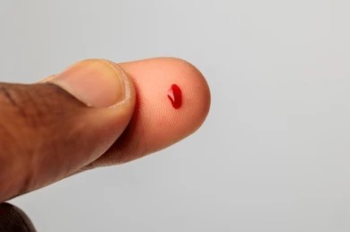 closeup-blood-droplet-on-fingertip-260nw-2459714155