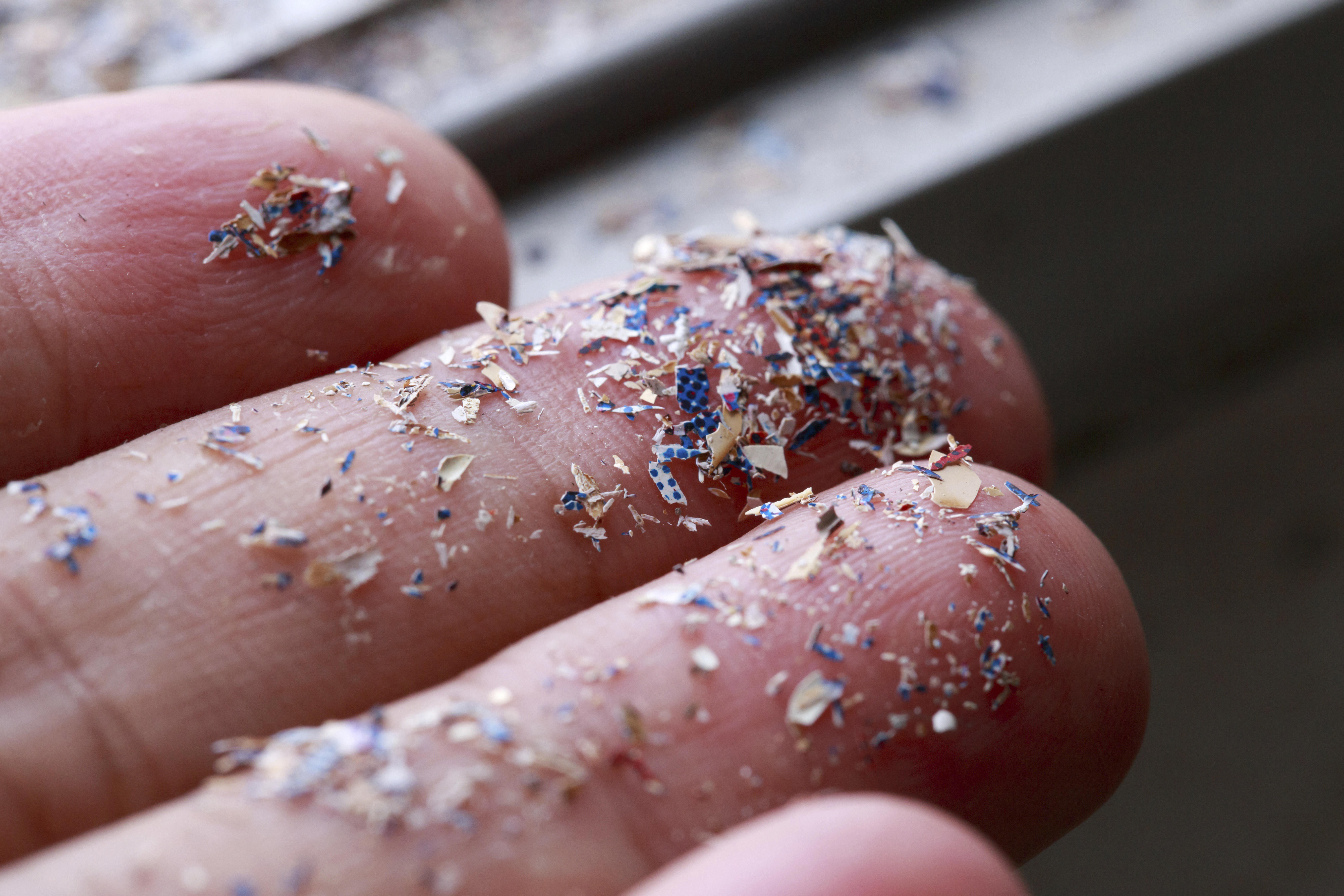 close-up-side-shot-of-microplastics-lay-on-people-handconcept-o_1