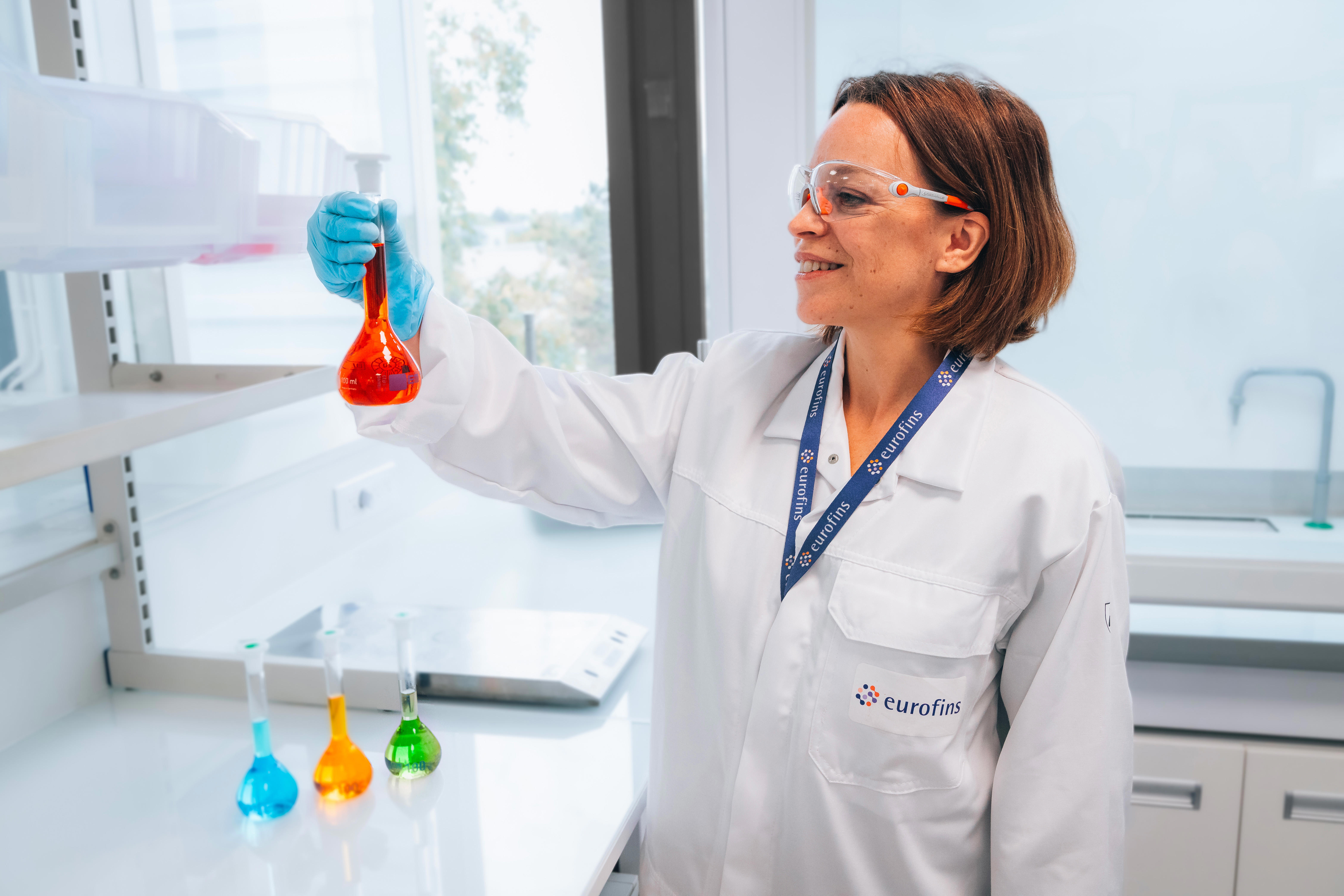 eurofins-lab-female-beaker